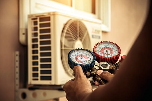Professional Air Conditioning Service technician working in Cantrall, IL